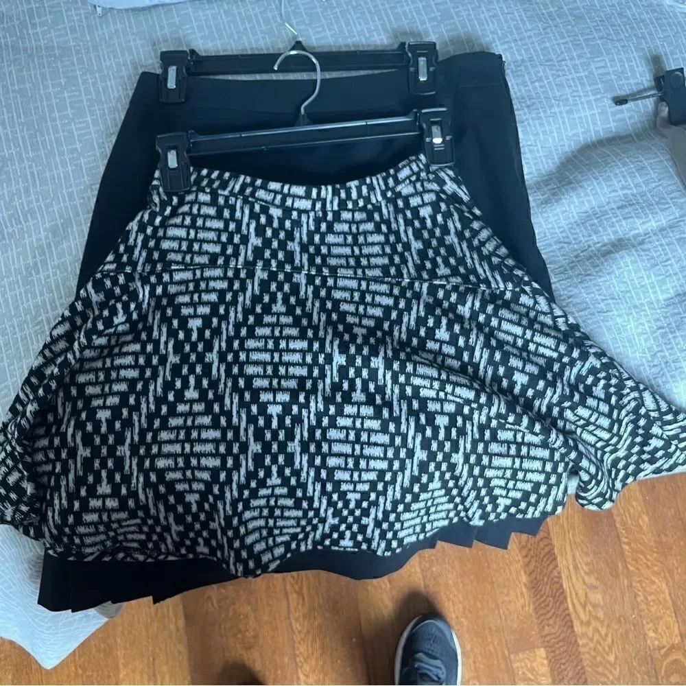 Aqua(Bloomingdales) black and white patterned circle skirt.